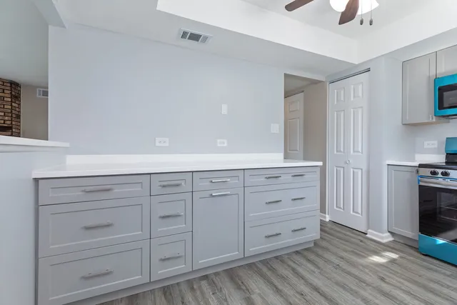 a view of a entrance and a television in a room