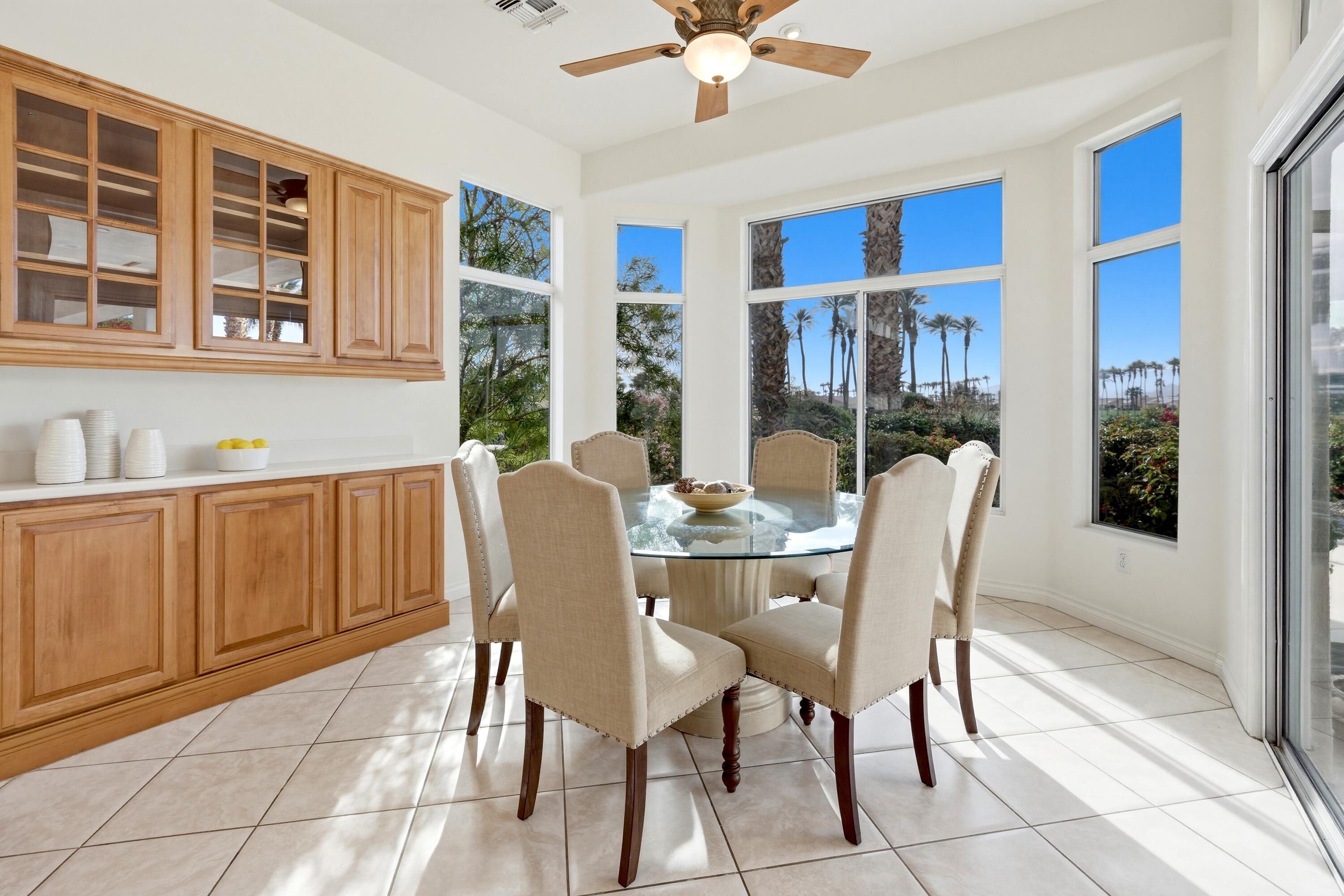 35440 Moorbrook Road Palm Desert, CA 92211 - Photo 18 of 32 a dining room with furniture and window
