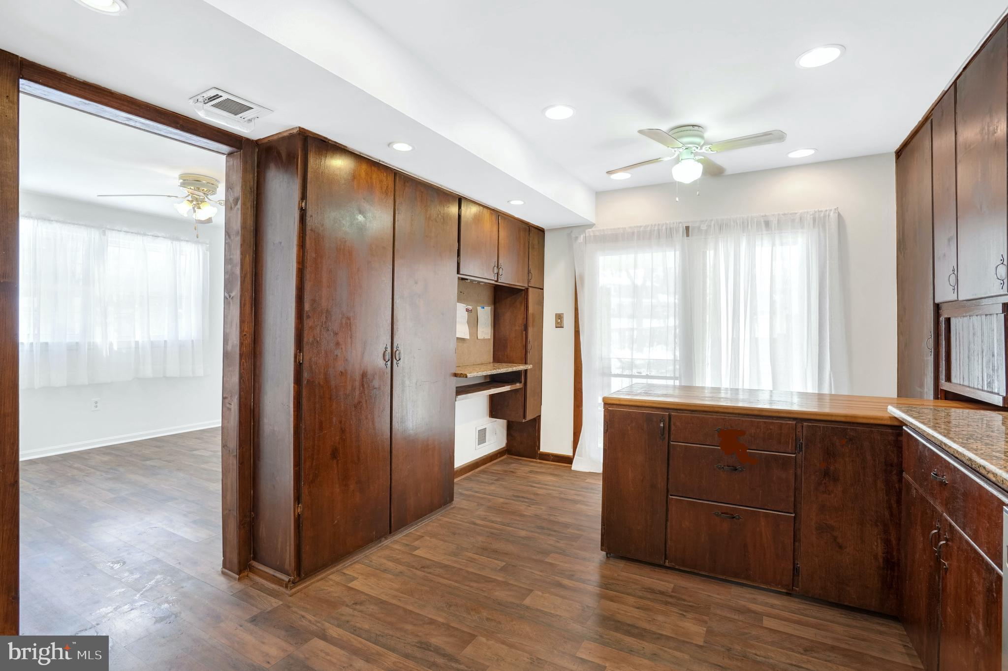 6710 Red Jacket Road Springfield, VA 22152 - Photo 17 of 53 a view of a kitchen cabinets a sink and wooden floor