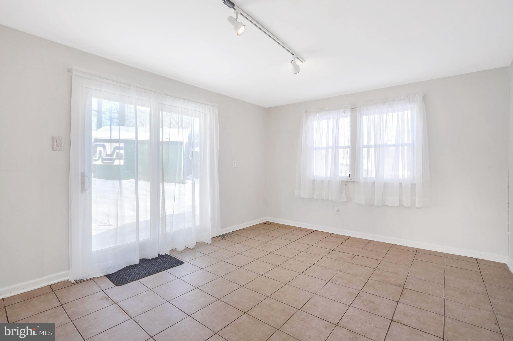6710 Red Jacket Road Springfield, VA 22152 - Photo 23 of 53 a view of an empty room with window