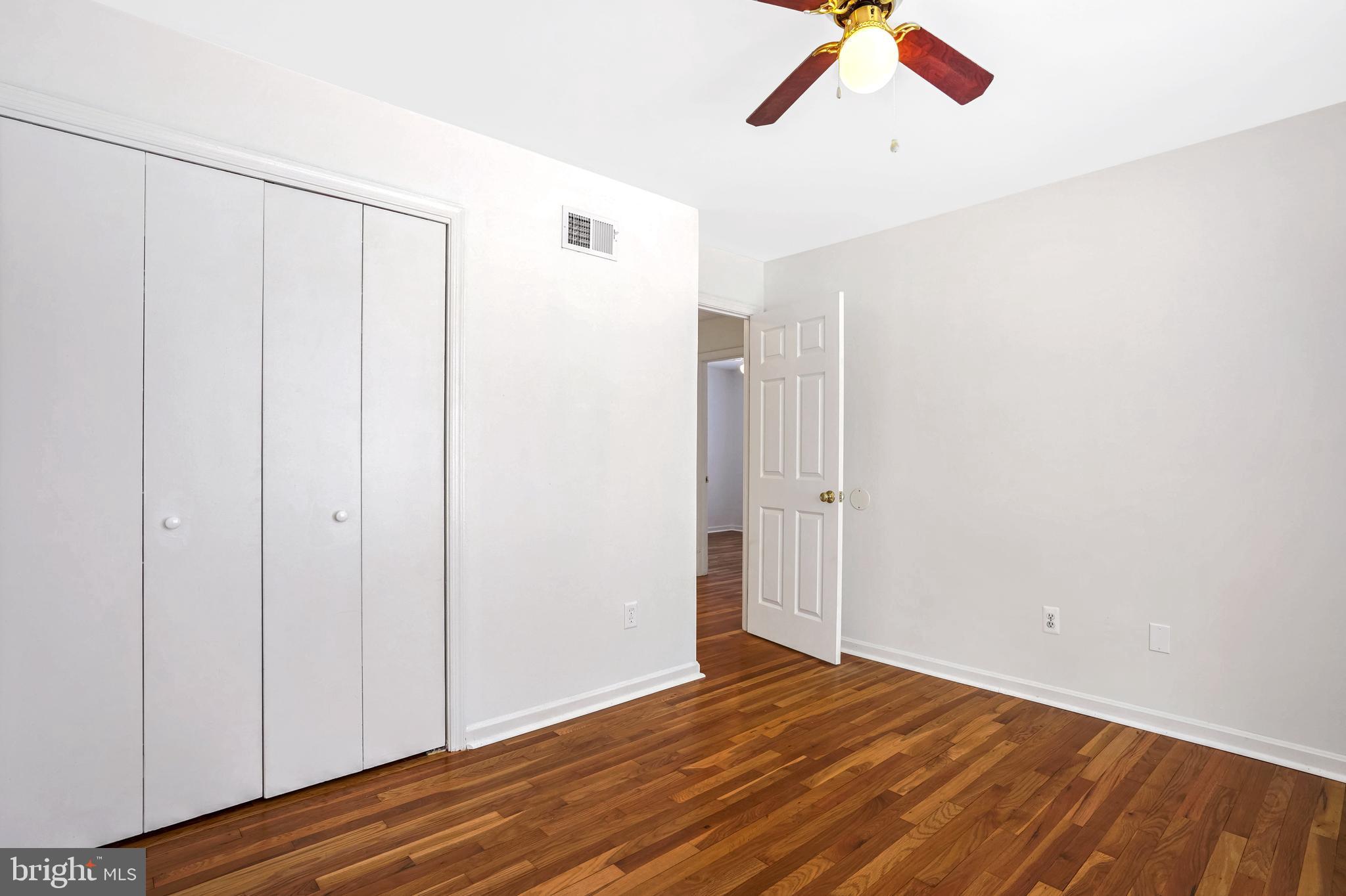 6710 Red Jacket Road Springfield, VA 22152 - Photo 41 of 53 a view of a livingroom with wooden floor