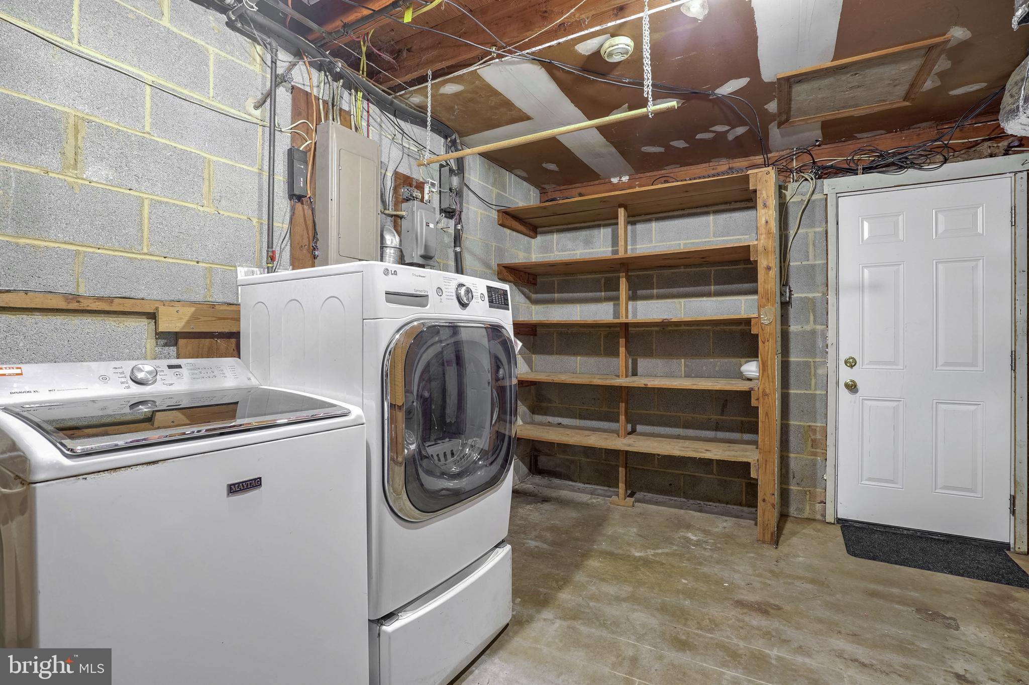 6710 Red Jacket Road Springfield, VA 22152 - Photo 49 of 53 a utility room with dryer and washer