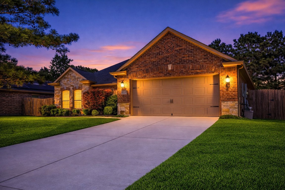 9022 Nina Road Conroe, TX 77304 - Photo 2 of 13 Clean lines, manicured lawn, and timeless curb appeal set the stage for easy, everyday living.