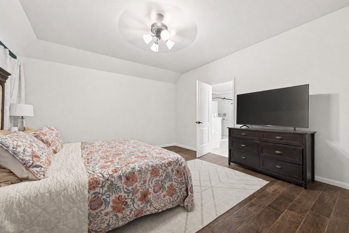 9022 Nina Road Conroe, TX 77304 - Photo 8 of 13 A retreat with soft light and generous proportions—your private escape at the end of the day.