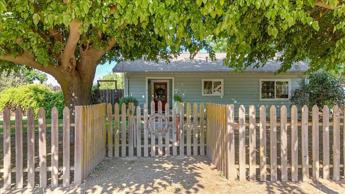 28937 Upper Road Newman, CA 95360 - Photo 2 of 36 This photo was taken in the spring to show the beautiful trees on exterior of the home.