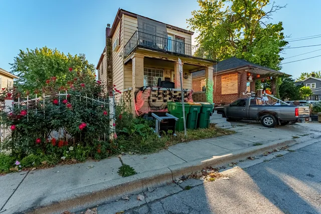 a car parked in front of a house