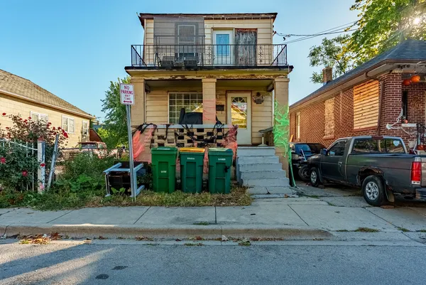 a car parked in front of a house