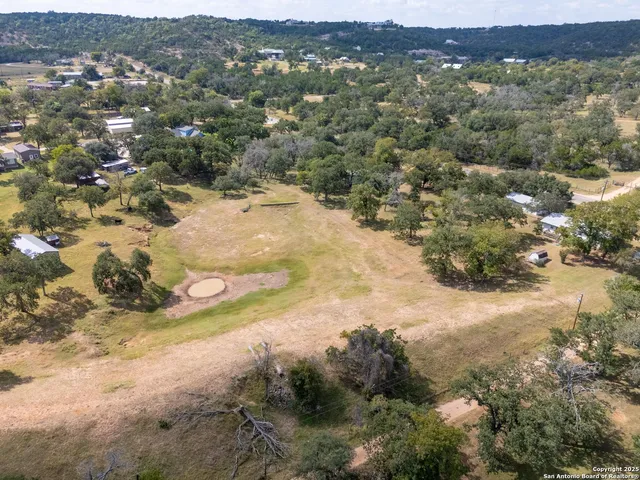 a view of a houses with a yard
