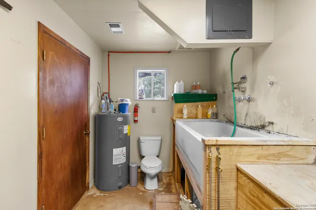 a very nice looking room with wooden floor and windows