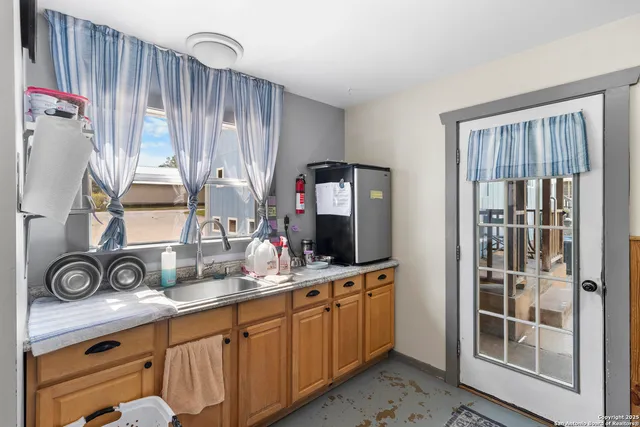 a view of a hallway with walk in closet