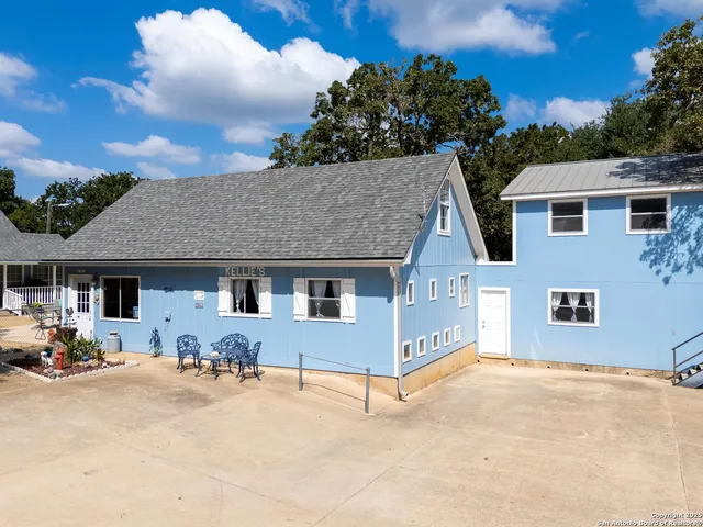 a front view of a house with yard