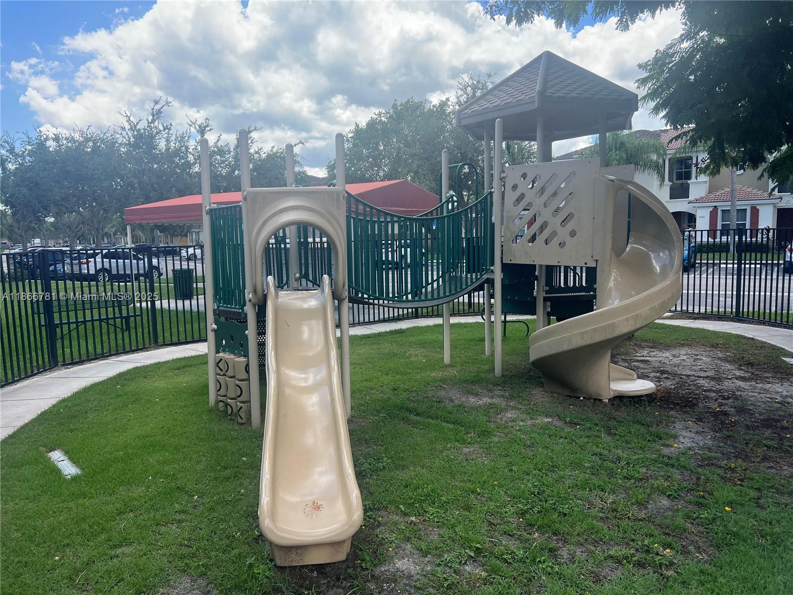 4287 Northeast 9th Street Homestead, FL 33033 - Photo 23 of 25 a view of a garden with a slide