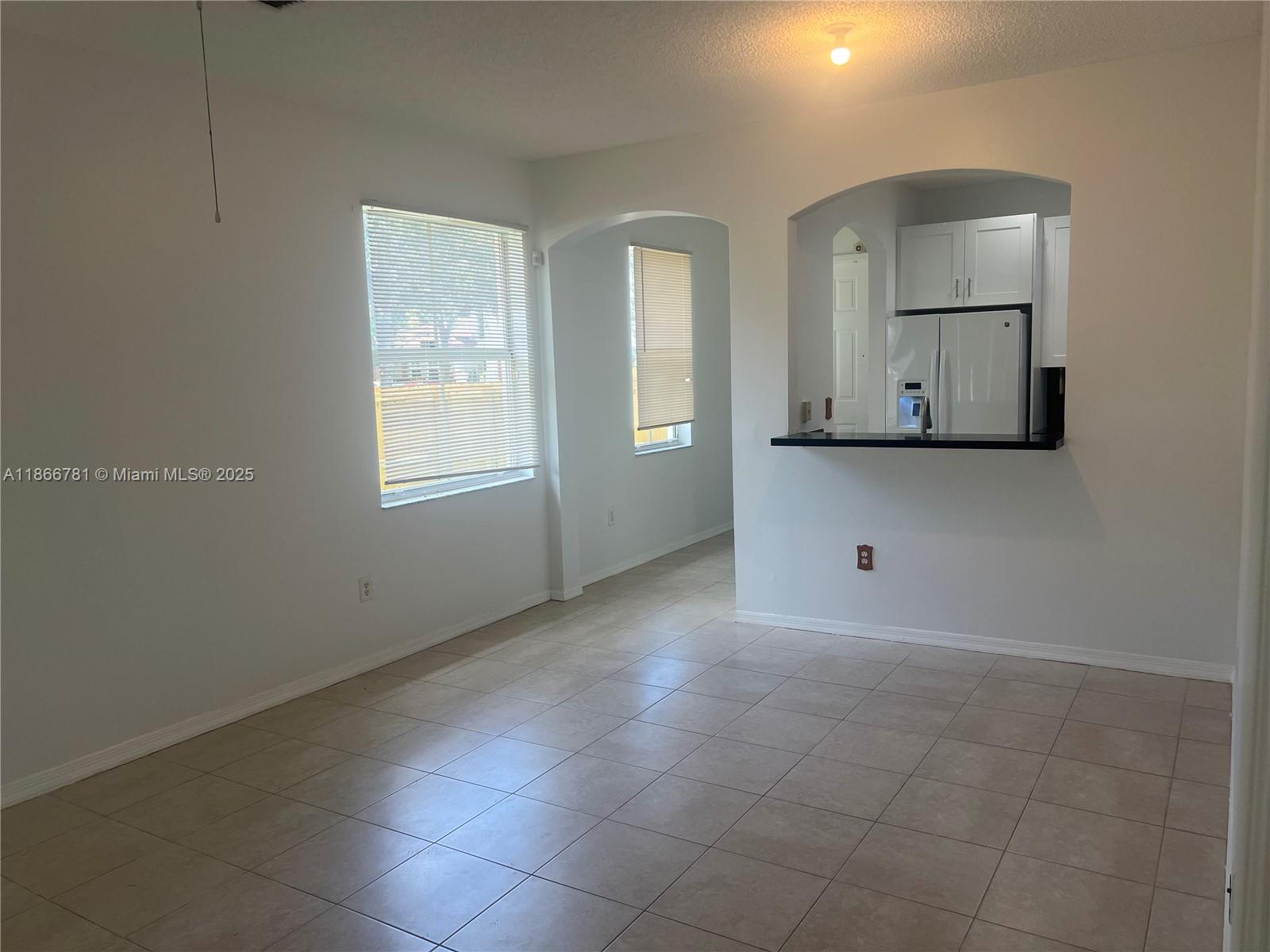 4287 Northeast 9th Street Homestead, FL 33033 - Photo 8 of 25 a view of room with window and cabinet