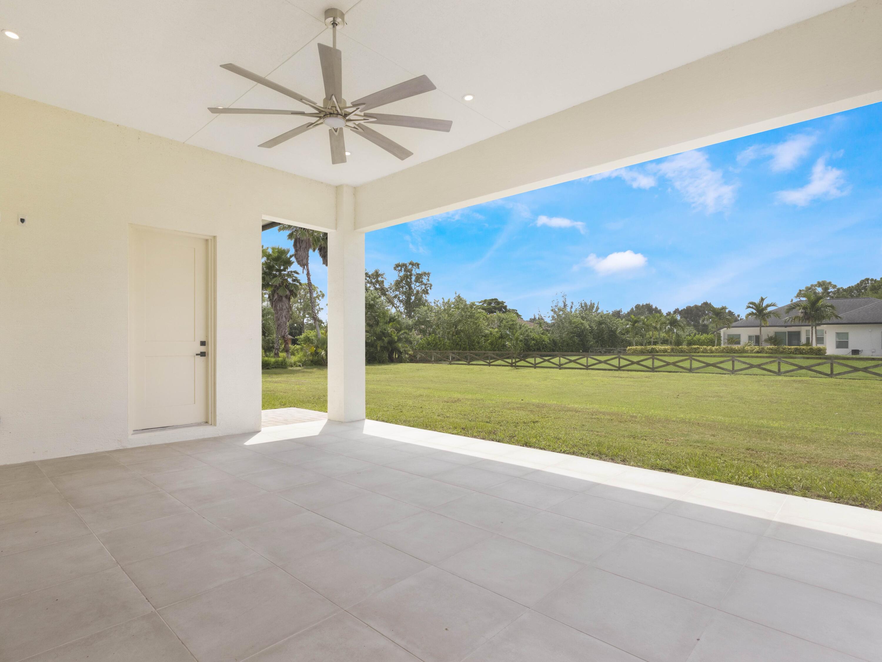 17436 71st Lane North Loxahatchee, FL 33470 - Photo 46 of 50 a view of a room with a ocean view