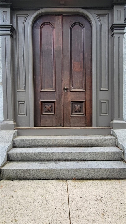 73 Elm Road, Unit 8 Newton, MA 02460 - Photo 2 of 12 a view of entryway and hall