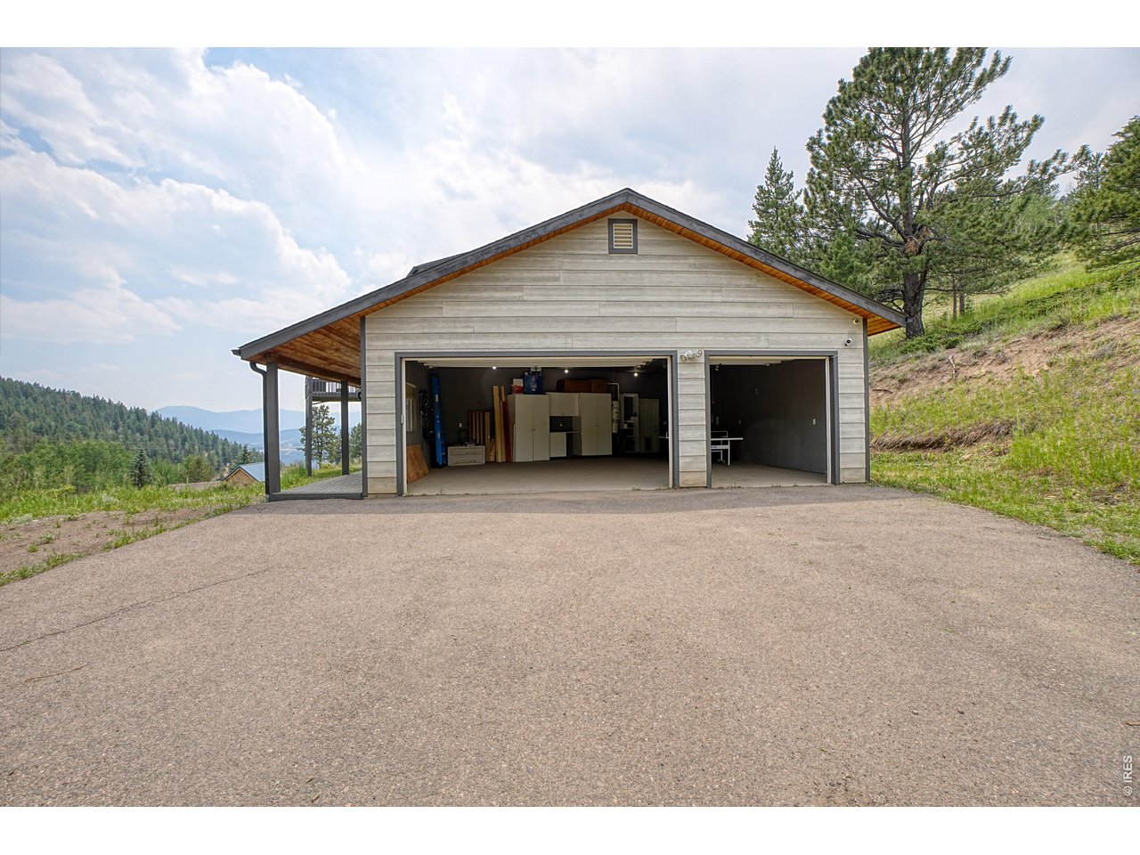 2353 Dory Hill Road Black Hawk, CO 80422 - Photo 40 of 50 Oversized, 3 car garage- plenty of room for parking + storage for all your outdoor gear & toys!