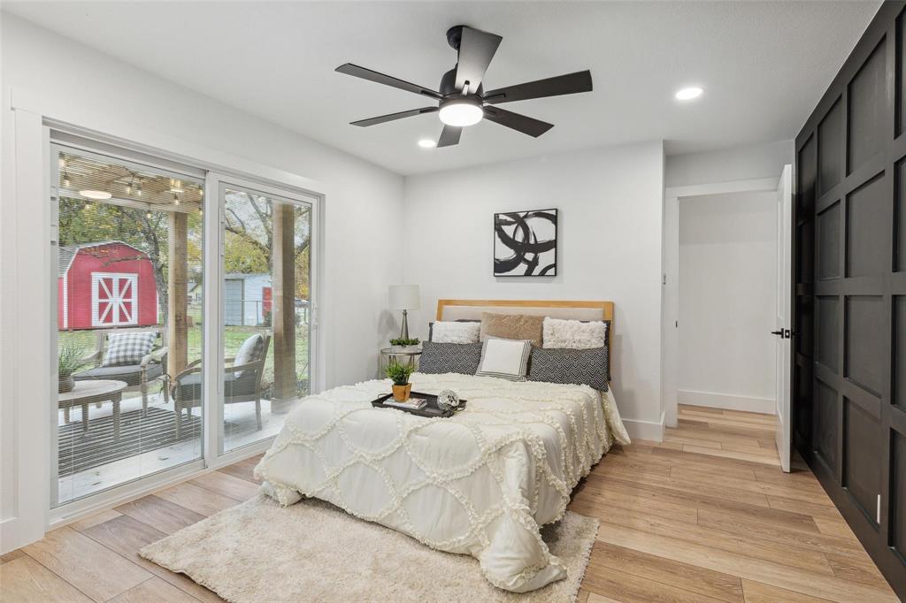 7274 Pecan Street Frisco, TX 75034 - Photo 6 of 13 a bedroom with a bed and a large window