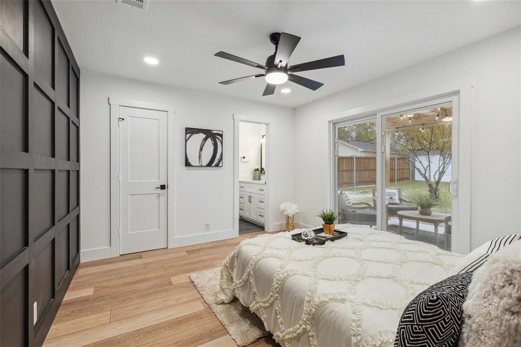 7274 Pecan Street Frisco, TX 75034 - Photo 7 of 13 a bedroom with a bed and a large window