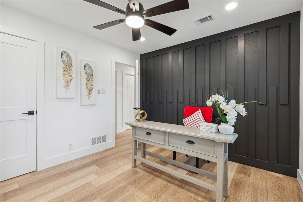 7274 Pecan Street Frisco, TX 75034 - Photo 9 of 13 wooden floor and a chandelier in a room