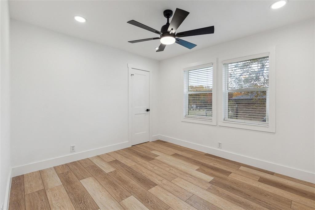 7274 Pecan Street Frisco, TX 75034 - Photo 10 of 13 a view of empty room with wooden floor and fan