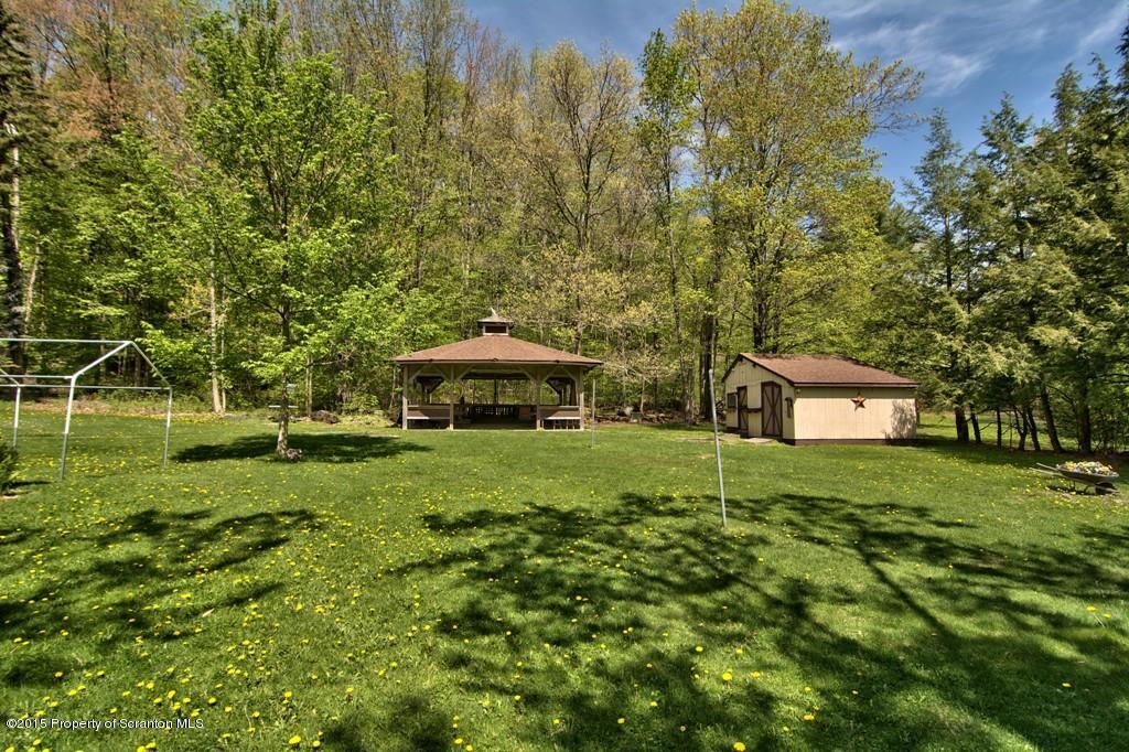 2335 Hamlin Road Moscow, PA 18444 - Photo 11 of 34 a view of a house with a yard