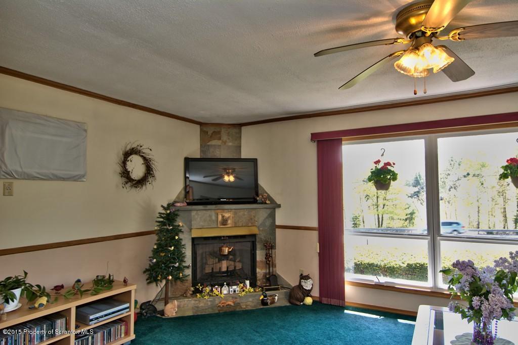2335 Hamlin Road Moscow, PA 18444 - Photo 13 of 34 a room with furniture and garden view