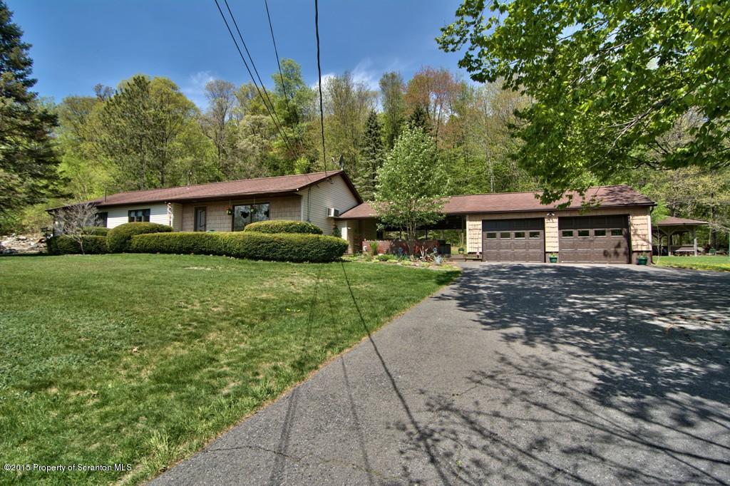 2335 Hamlin Road Moscow, PA 18444 - Photo 3 of 34 a front view of a house with garden
