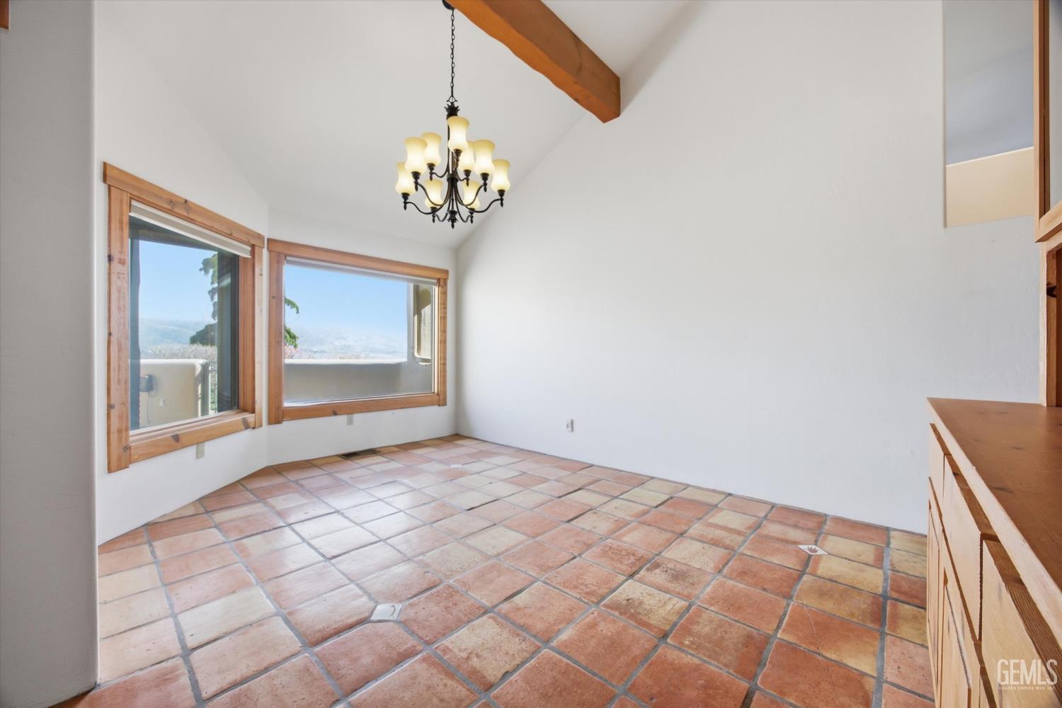 Undisclosed Address Tehachapi, CA 93561 - Photo 16 of 70 a view of an empty room with a window