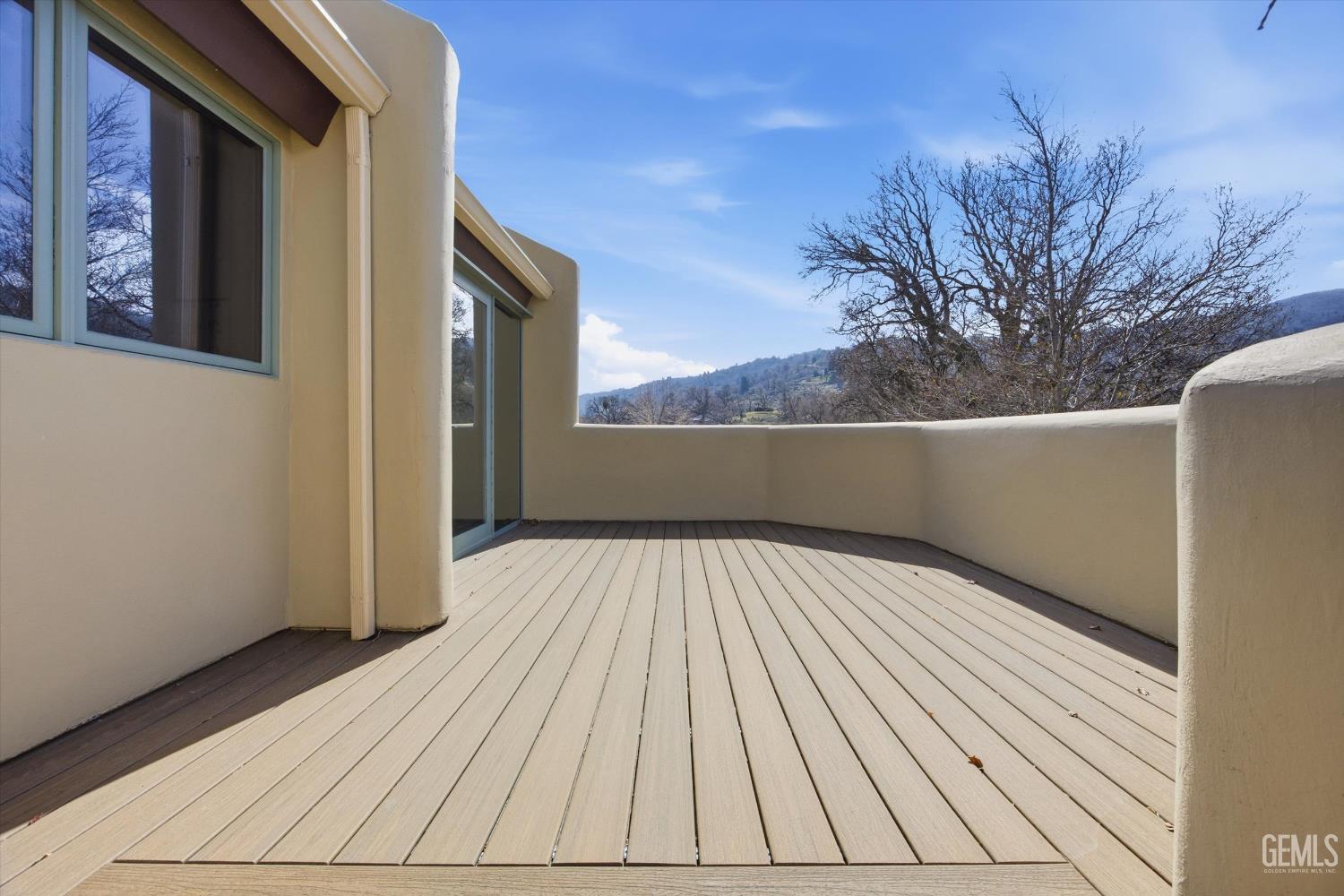 Undisclosed Address Tehachapi, CA 93561 - Photo 57 of 70 a view of backyard with wooden floor and fence