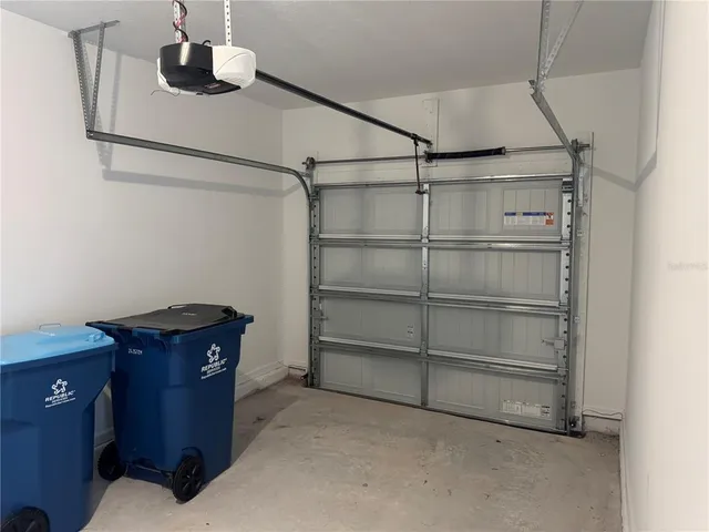 a room with closet and wooden floor