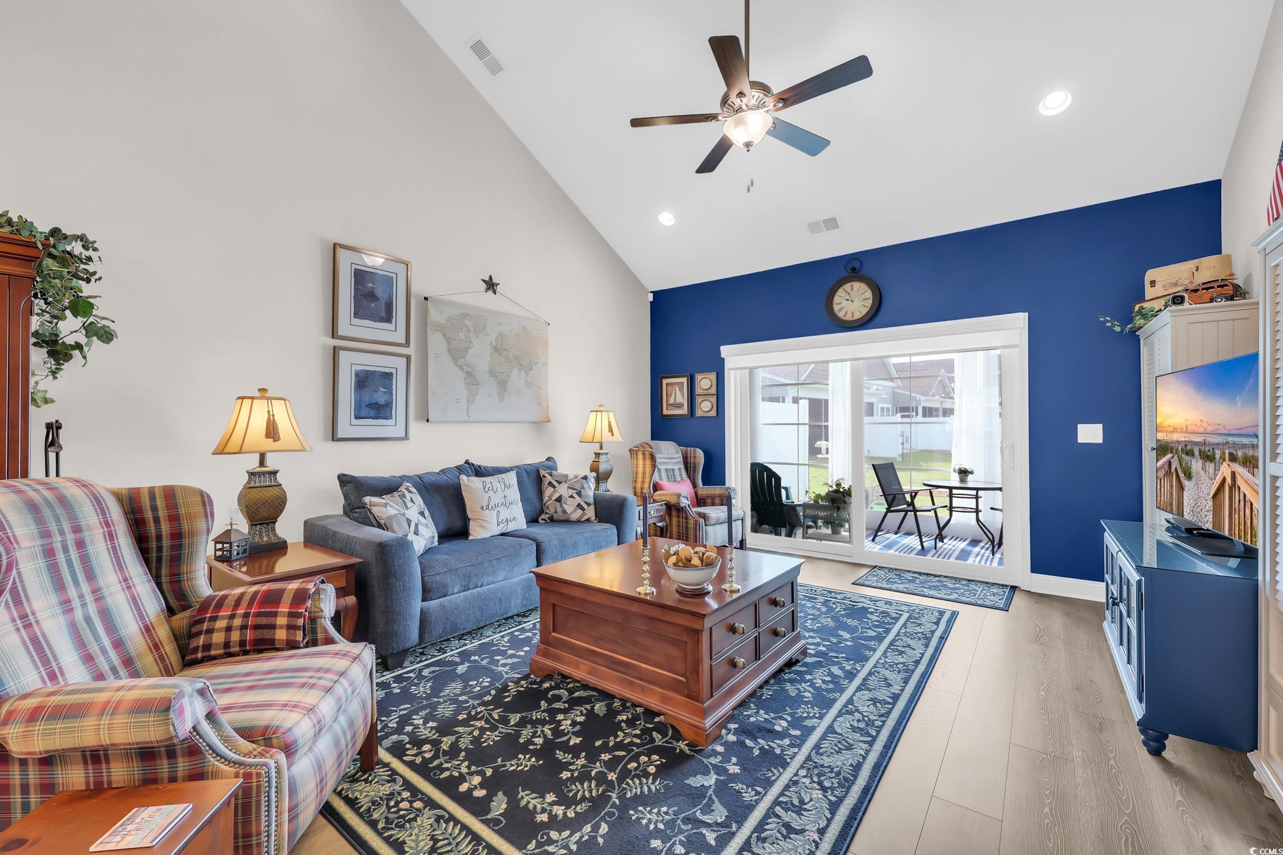147 Machrie Loop, Unit D Myrtle Beach, SC 29588 - Photo 8 of 36 Living area featuring light wood-style flooring, high vaulted ceiling, a ceiling fan, and recessed lighting