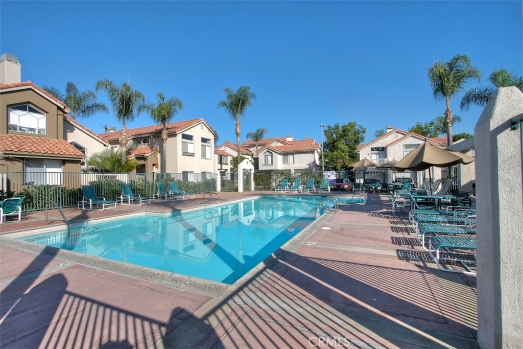 8 Coral Ridge, Unit 109 Laguna Niguel, CA 92677 - Photo 23 of 29 a view of a swimming pool with a patio