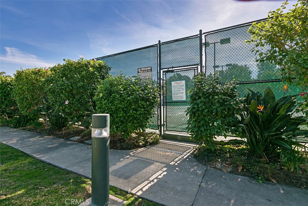 8 Coral Ridge, Unit 109 Laguna Niguel, CA 92677 - Photo 29 of 29 a front view of a house with garden