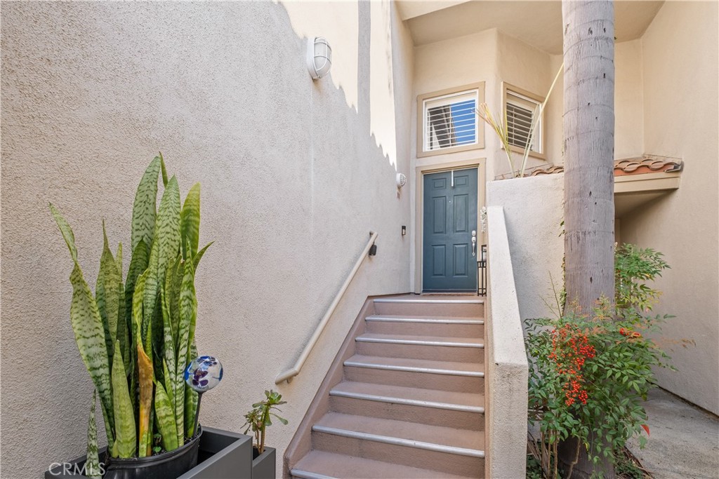 8 Coral Ridge, Unit 109 Laguna Niguel, CA 92677 - Photo 3 of 29 a view of a potted flower in a corridor