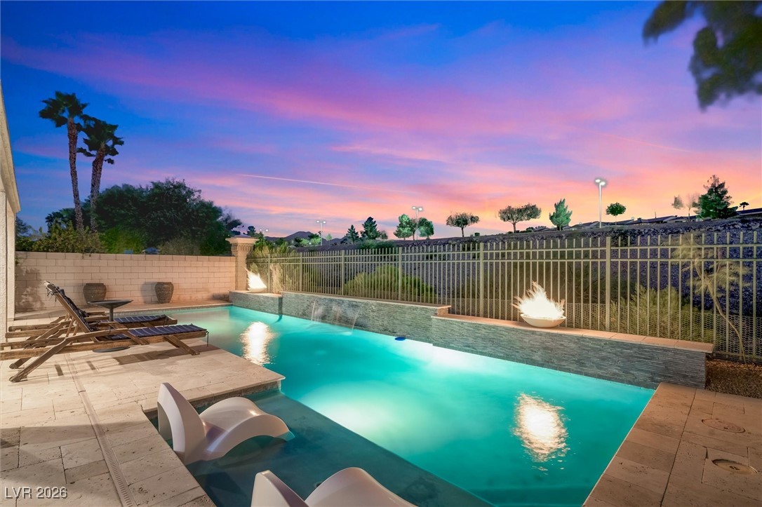 Pool & Patio at dusk- gorgeous sunsets and no rear neighbors.