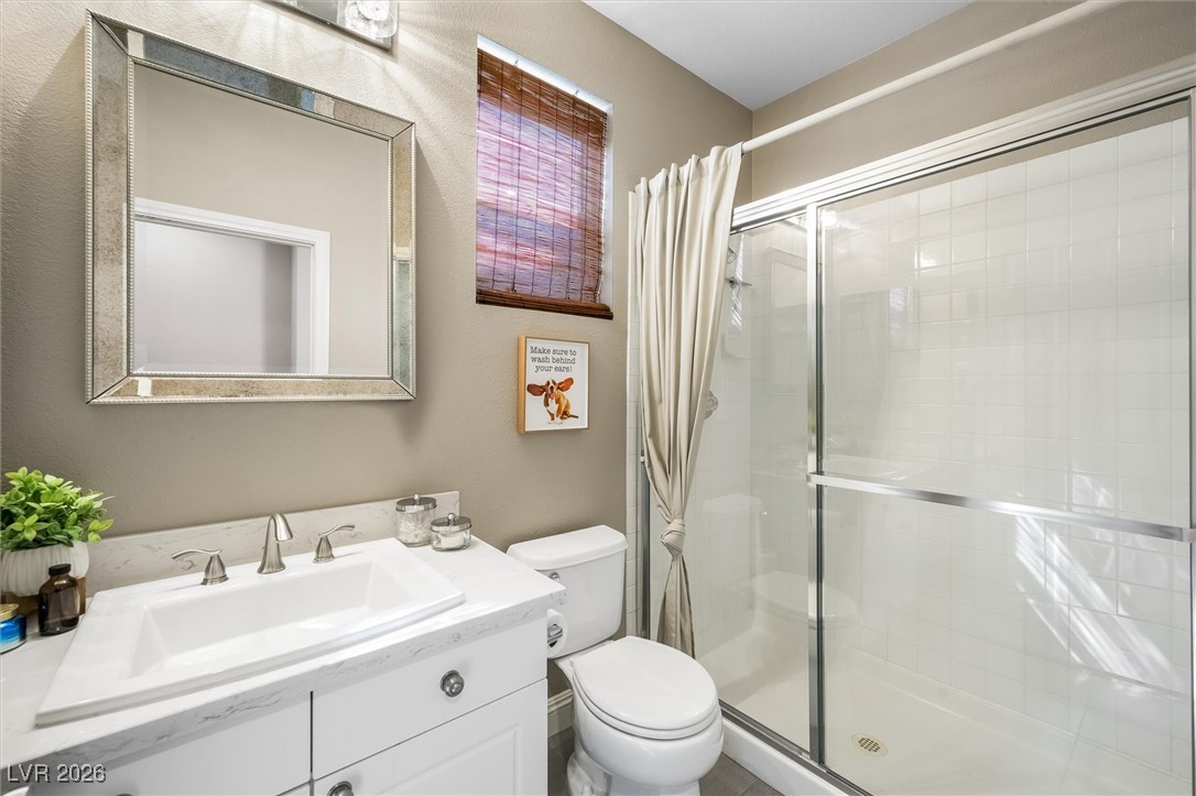 1673 Ravanusa Drive Henderson, NV 89052 - Photo 26 of 66 Downstairs bath with a shower