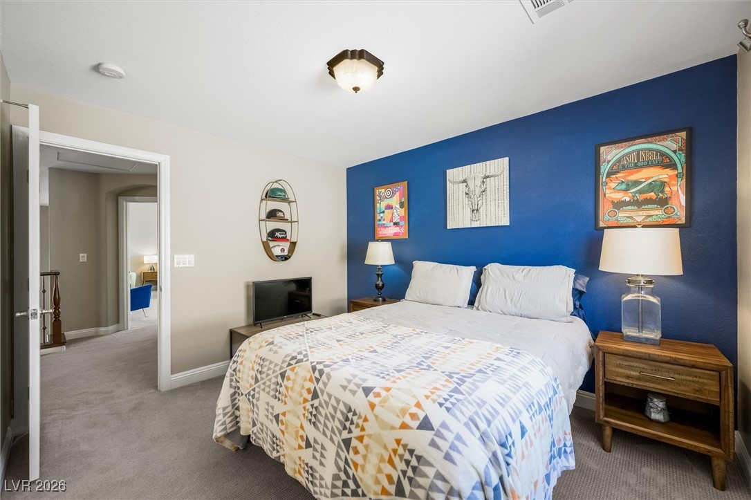 1673 Ravanusa Drive Henderson, NV 89052 - Photo 36 of 66 Bedroom with carpet and baseboards