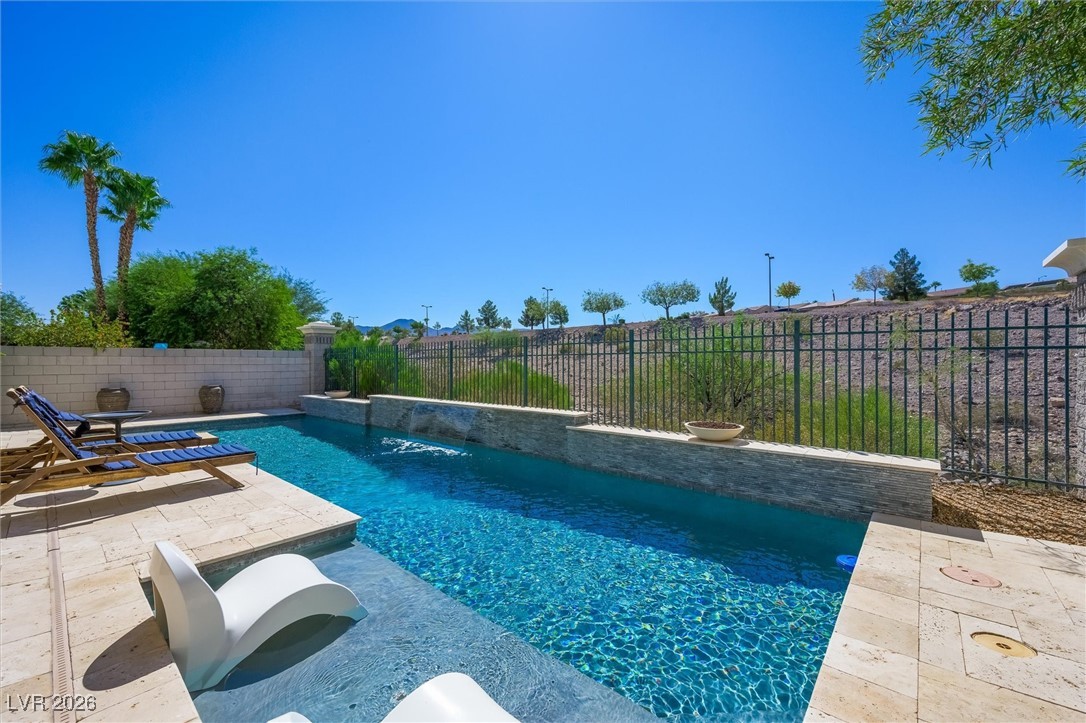 1673 Ravanusa Drive Henderson, NV 89052 - Photo 44 of 66 View of swimming pool with a fenced backyard and a patio area