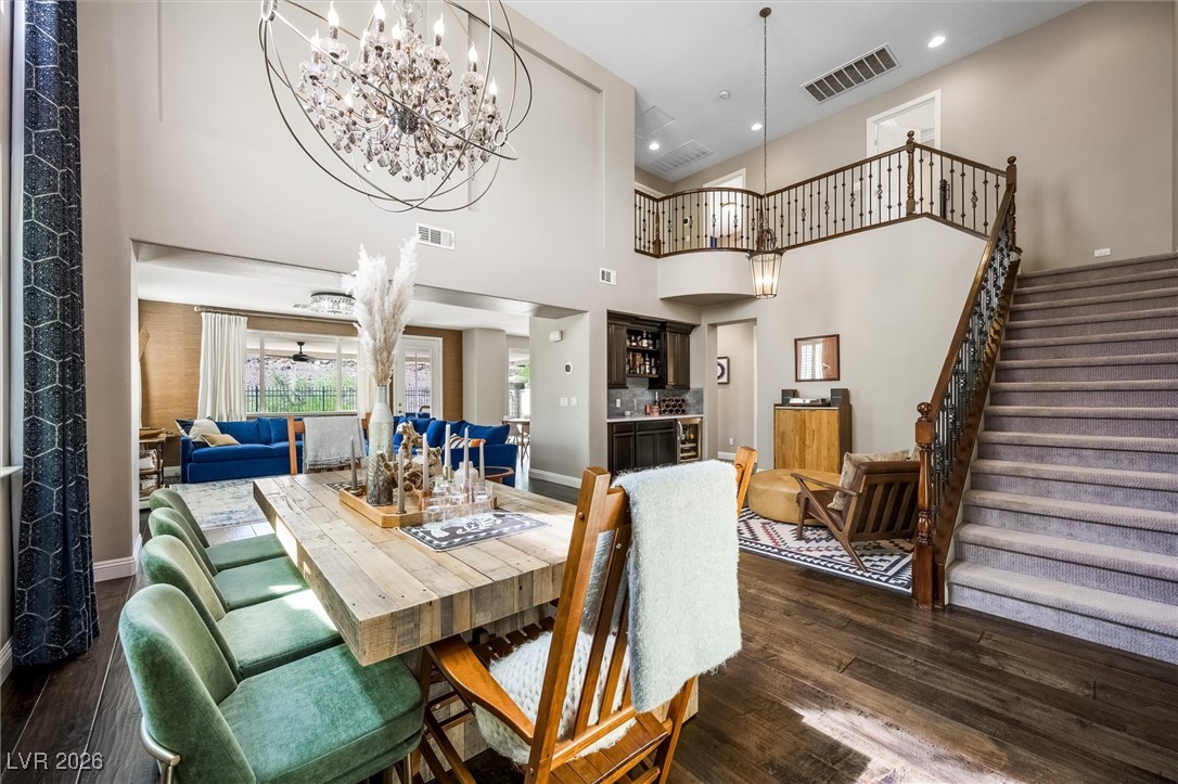 1673 Ravanusa Drive Henderson, NV 89052 - Photo 5 of 66 Timeless dark hardwood flows throughout the first floor.