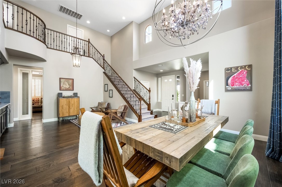 1673 Ravanusa Drive Henderson, NV 89052 - Photo 6 of 66 The dining room features a beautiful Restoration Hardware chandelier