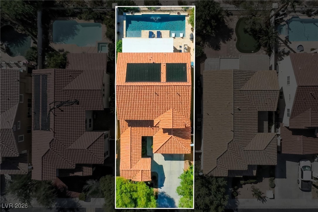 1673 Ravanusa Drive Henderson, NV 89052 - Photo 61 of 66 Aerial view of property's location featuring property boundaries highlighted and a pool area