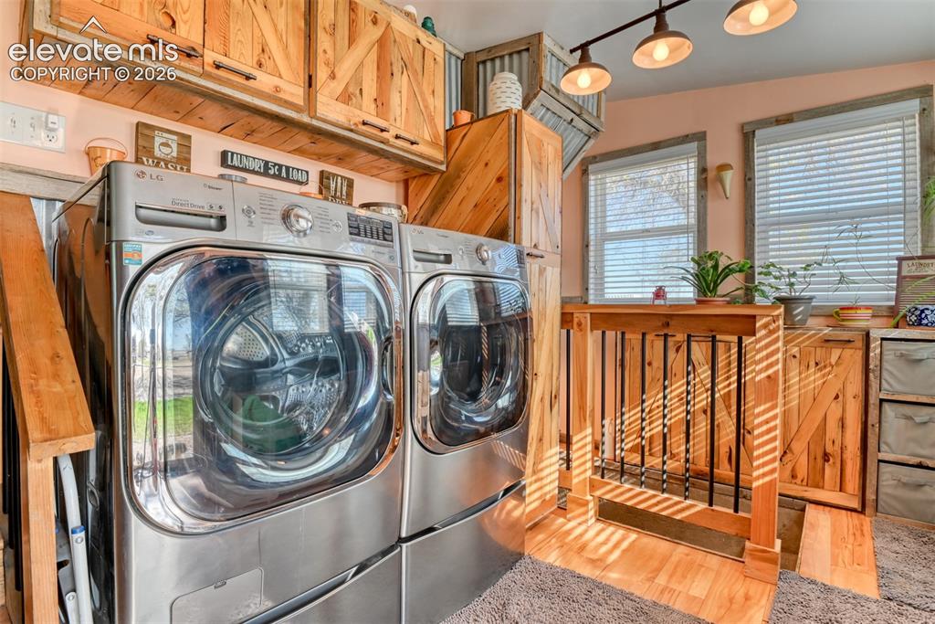 22558 Enoch Road Calhan, CO 80808 - Photo 40 of 50 a utility room with dryer and washer
