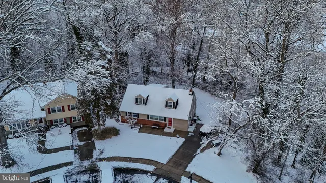 an aerial view of a chairs and table in the patio