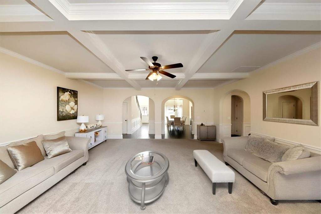 4058 Rosebay Way Southwest Conyers, GA 30094 - Photo 12 of 55 a living room with furniture and a large window