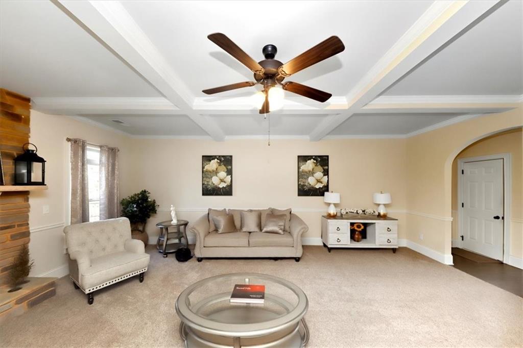 4058 Rosebay Way Southwest Conyers, GA 30094 - Photo 13 of 55 a living room with furniture and a ceiling fan