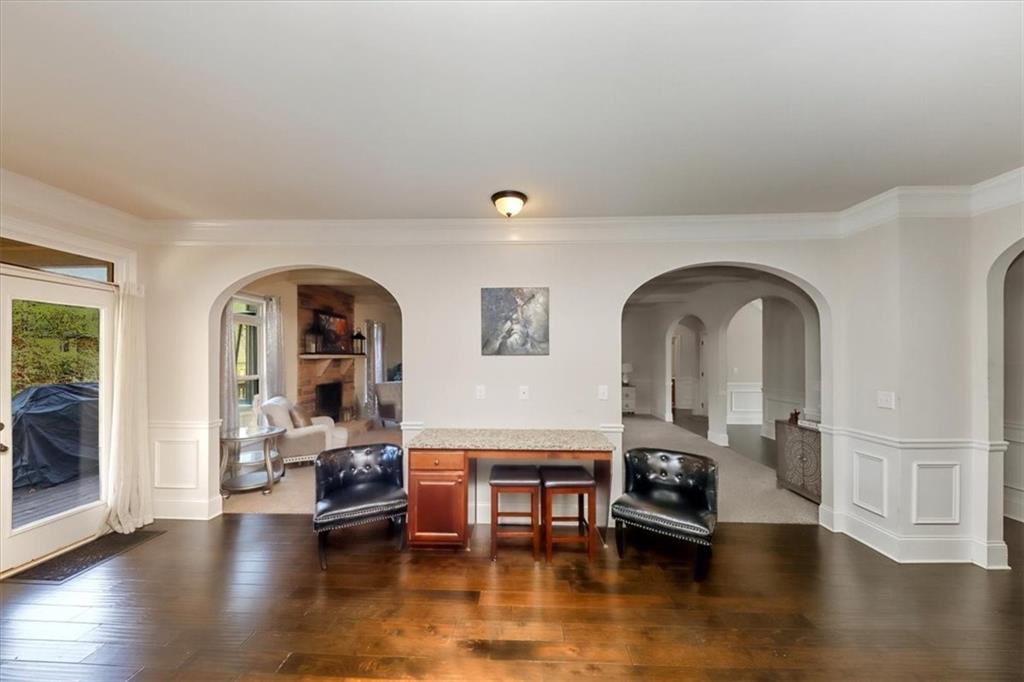 4058 Rosebay Way Southwest Conyers, GA 30094 - Photo 19 of 55 a living room with fireplace furniture and a wooden floor