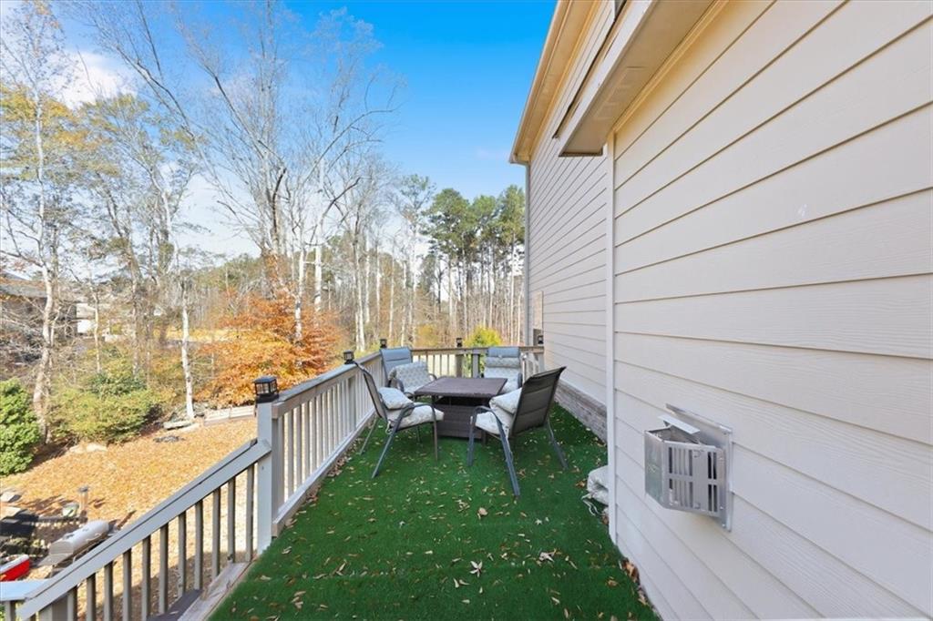4058 Rosebay Way Southwest Conyers, GA 30094 - Photo 37 of 55 a view of a deck with a backyard