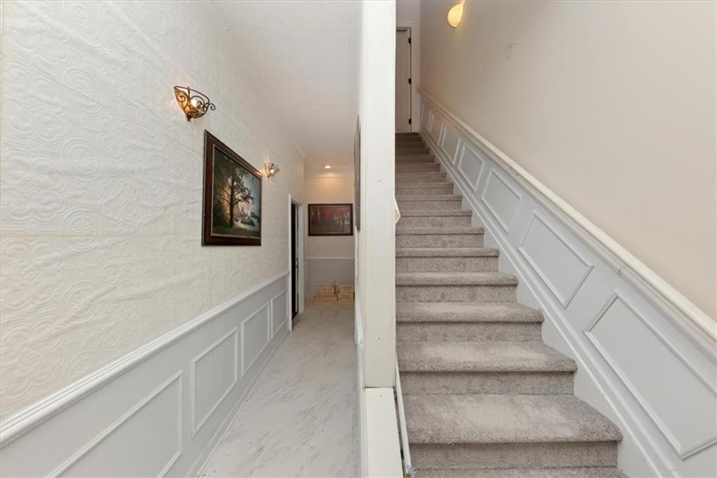 4058 Rosebay Way Southwest Conyers, GA 30094 - Photo 41 of 55 a view of a hallway with staircase