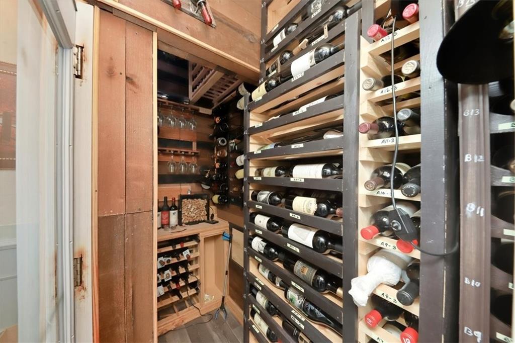 4058 Rosebay Way Southwest Conyers, GA 30094 - Photo 46 of 55 a view of walk in closet with clothes and shoes