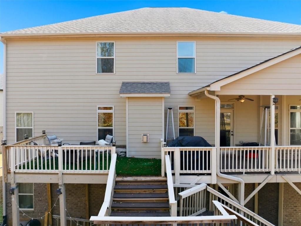 4058 Rosebay Way Southwest Conyers, GA 30094 - Photo 48 of 55 front view of a house with a deck